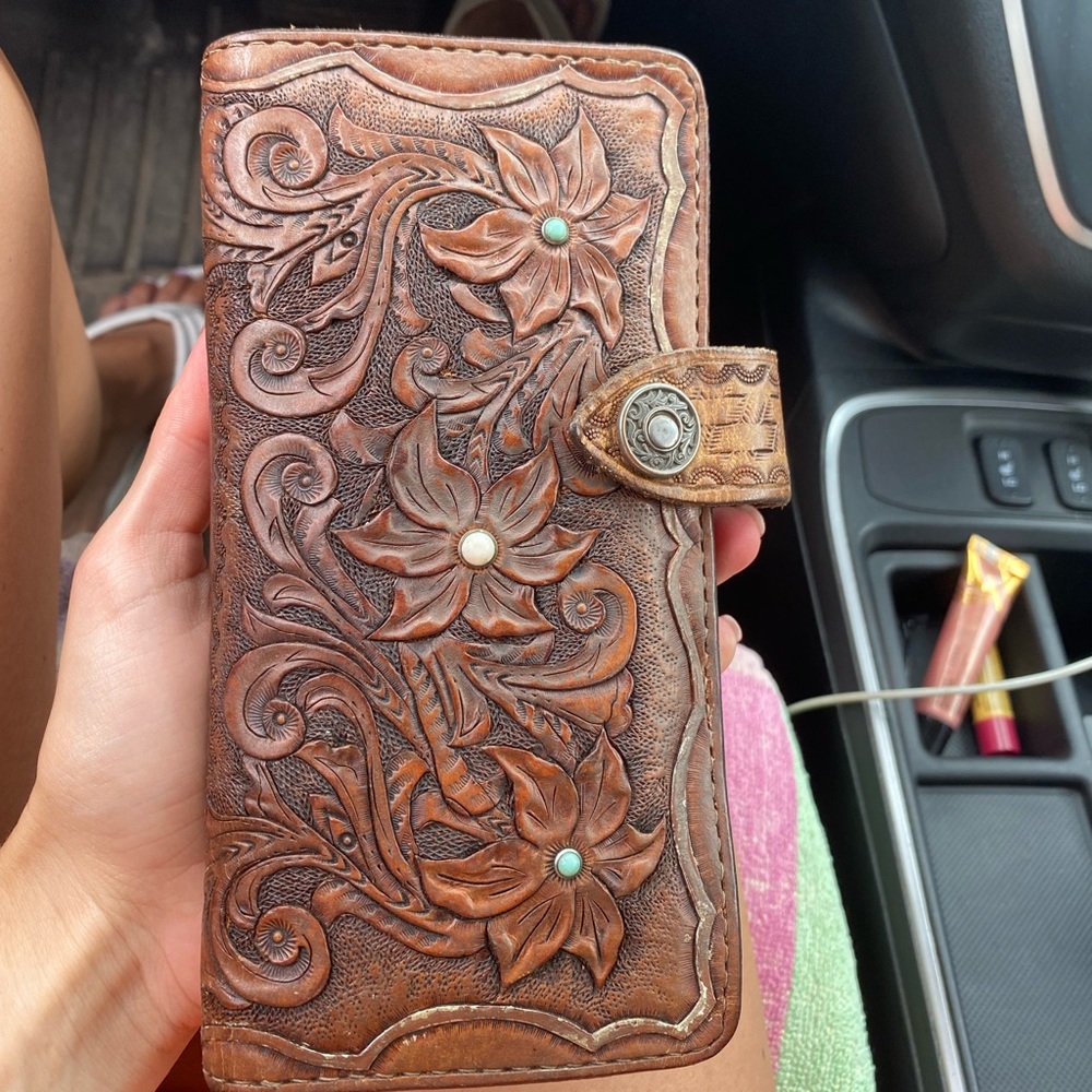 Hand tooled leather clutch